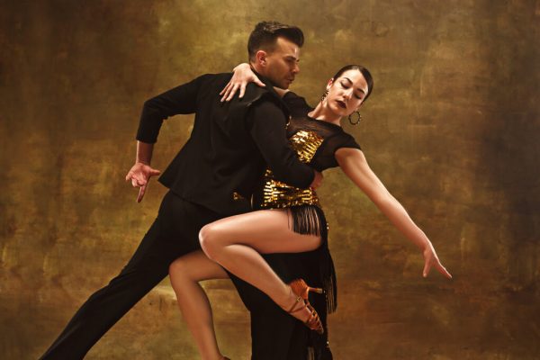 dance-ballroom-couple-in-gold-dress-dancing-on-studio.jpg dance-ballroom-couple-in-gold-dress-dancing-on-studio.jpg